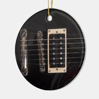 Ornamento negro elegante de la guitarra eléctrica