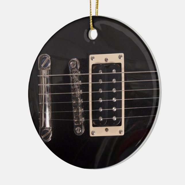 Ornamento negro elegante de la guitarra eléctrica (Izquierda)