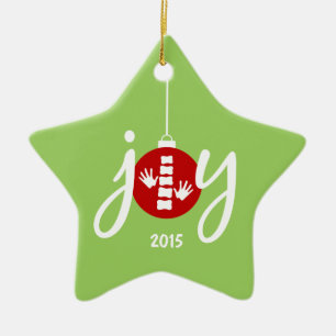 Ornamento rojo del navidad de la alegría de la
