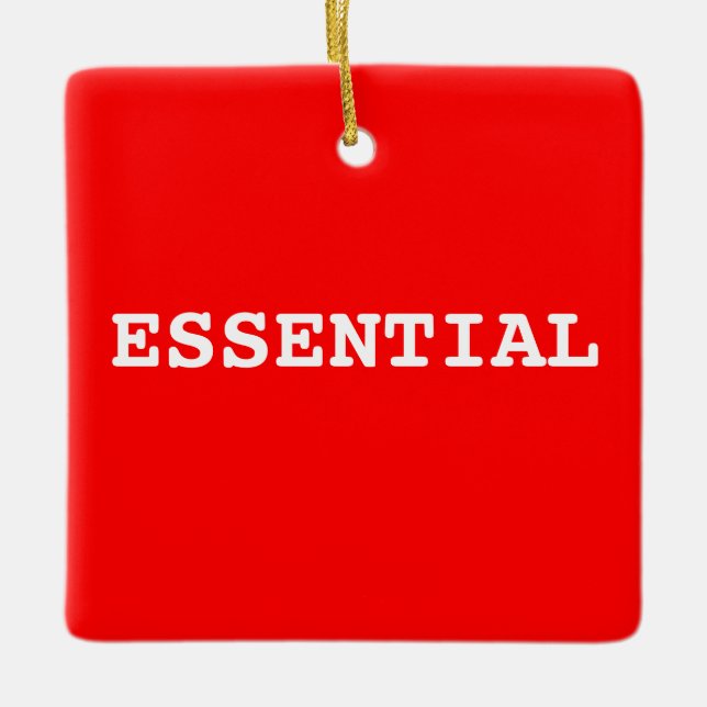 Ornamento rojo que dice esencial (Anverso)