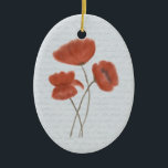 Ornamento rojo romántico de las amapolas<br><div class="desc">Añada un tacto romántico a su árbol de navidad con este ornamento de cerámica oval de mi dibujo en colores pastel digital creado de la original, evocador de pinturas florales a partir del siglo XIX. La imagen está de tres amapolas rojas en el centro de un pedazo - azul -...</div>