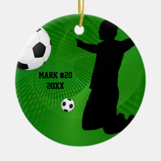 Ornamento verde y negro del navidad del fútbol