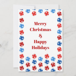 Ornamentos azules y rojos de navidad con copos de