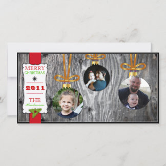 Ornamentos de Navidad en la tarjeta fotográfica de