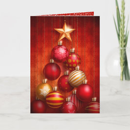 Ornamentos rojos de árbol de Navidad doblados