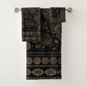 Oro oriental del ornamento de Paisley en negro