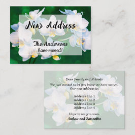 Orquídeas Blancas en Verde Anuncio de Nueva Direcc