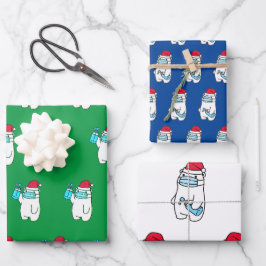 OSO CUCIOSO CON HOJAS PLANAS DE PAPEL DE REGALO
