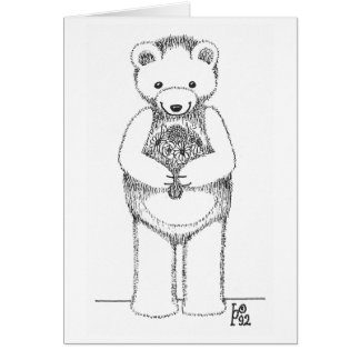 Oso de peluche con las flores