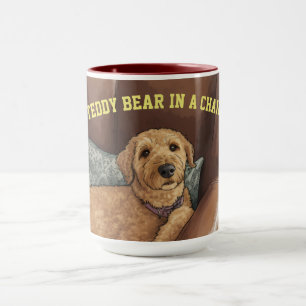 Oso de peluche en una silla, la taza