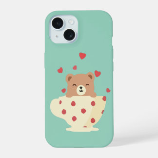 Oso de peluche sonriente acogedor en taza de té de