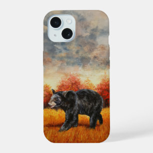 Oso negro en bosque otoñal