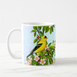 Pájaro americano del Goldfinch en taza del manzano