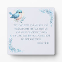 Pájaro azul con los números 6 placa 24-26