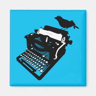 Pájaro en un imán de la máquina de escribir (fo