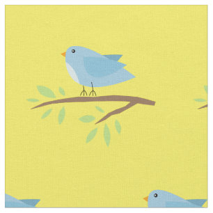 Pájaro lindo en una tela de materia textil del