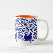 Pájaro y estampado de plores taza azul y blanca