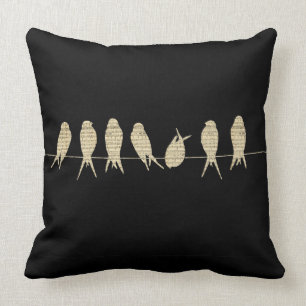 Pájaros en una almohada del alambre