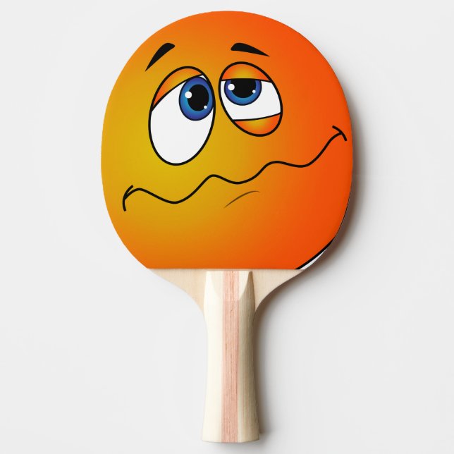 Pala de ping pong con emoji. (Anverso)