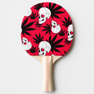 Pala De Ping Pong Hoja de planta herbal y calaveras sobre rojo