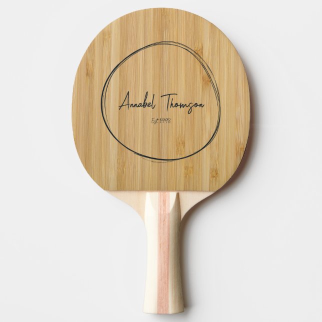 Pala De Ping Pong Nombre de Bambú Oscuro en Círculo Dibujado (Anverso)