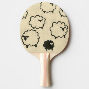 Pala De Ping Pong Ovejas blancas y negras en el fondo poner crema