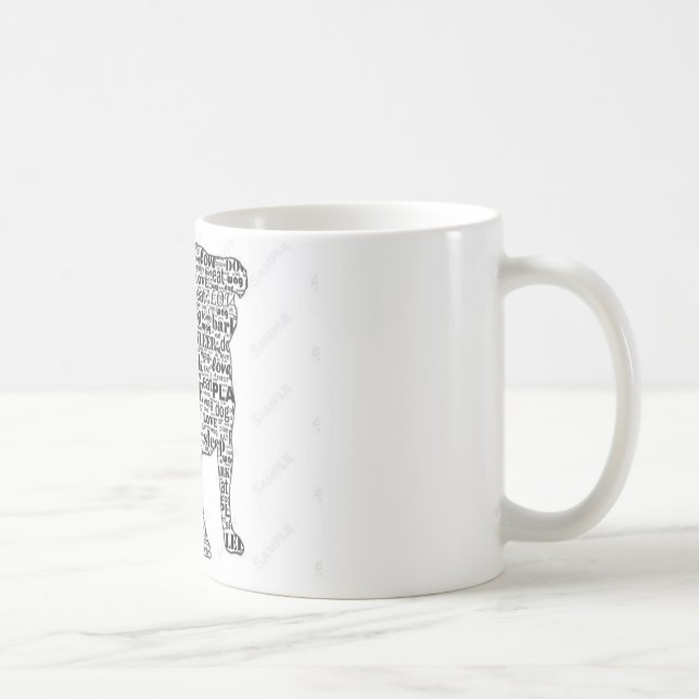Palabras del barro amasado en taza negra de la (Derecha)