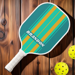 Palas De Pickleball Bandas de la orilla del mar iluminadas con luz sol