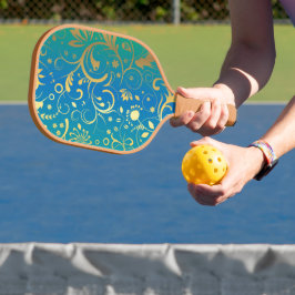 Palas De Pickleball Floral Dorado sobre Fondo Gradiente Verde y Azul