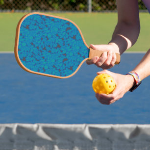 Palas De Pickleball fondo azul y negro con un patrón