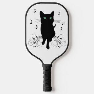 Palas De Pickleball Gato negro rodeado de notas de música susurrantes