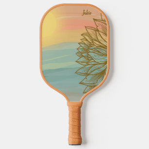 Palas De Pickleball Hermosa puesta de sol sobre las aguas floridas