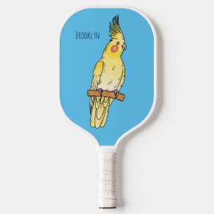 Palas De Pickleball Ilustración de dibujos animados de ave cockatiel
