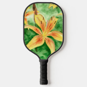 Palas De Pickleball Lirios amarillos en el jardín