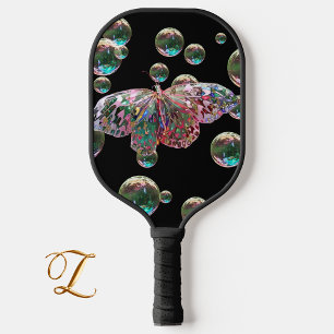 Palas De Pickleball Mariposa levantando pádel de bola
