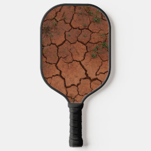 Palas De Pickleball tierra seca y agrietada