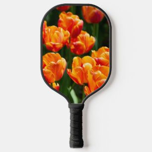Palas De Pickleball Tulipanes naranjas brillantes en el parque