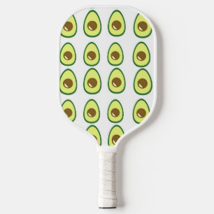 Palas De Pickleball Vocado verde rebanado sobre blanco