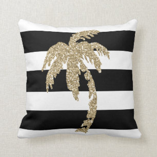 Palmera de oro en la almohada negra y blanca de