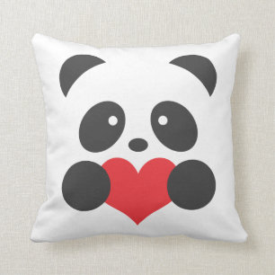 Panda con una almohada del corazón