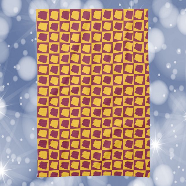 Paño De Cocina Arizona Geometric Maroon and Gold Pattern (A kitchen towel with a maroon and gold pattern featuring the US state of Arizona)
