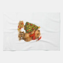 Capibara de Navidad decorando el árbol