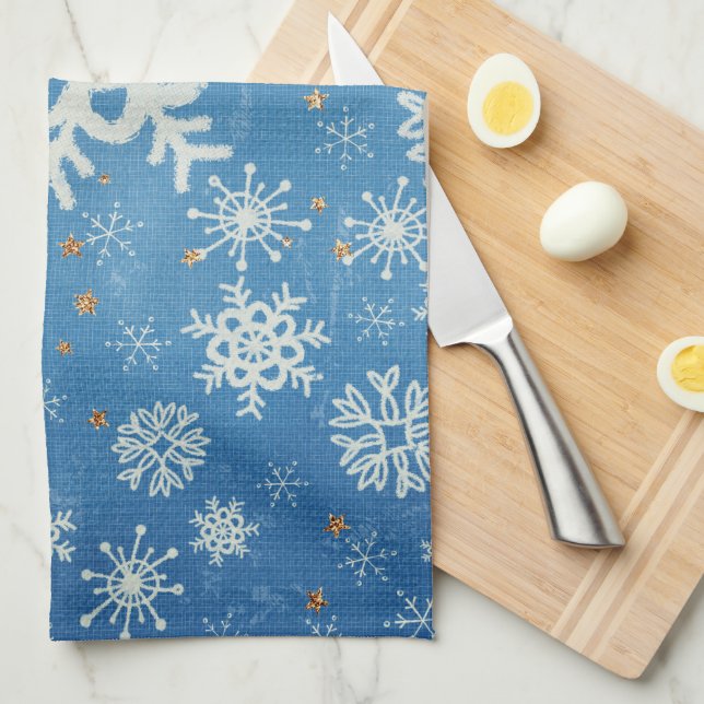 Paño De Cocina Copos de nieve y estrellas de oro en cocina azul (Doblado Cuarto)