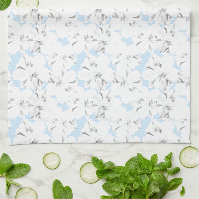 Paño De Cocina Flores blancas en azul claro. (Doblado)