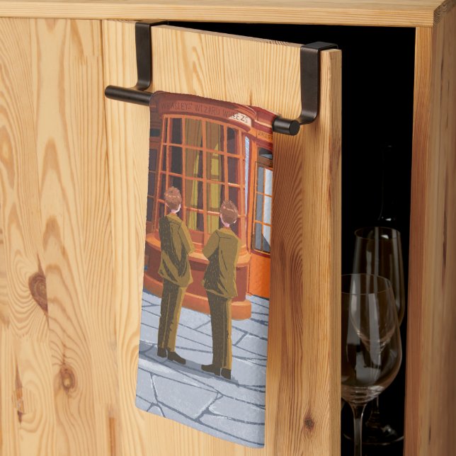 Paño De Cocina Fred y George en Weasley's Wizard Wheezes (Pliegue de tercios)
