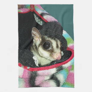 Paño De Cocina Glider azucarero usando un Gorra