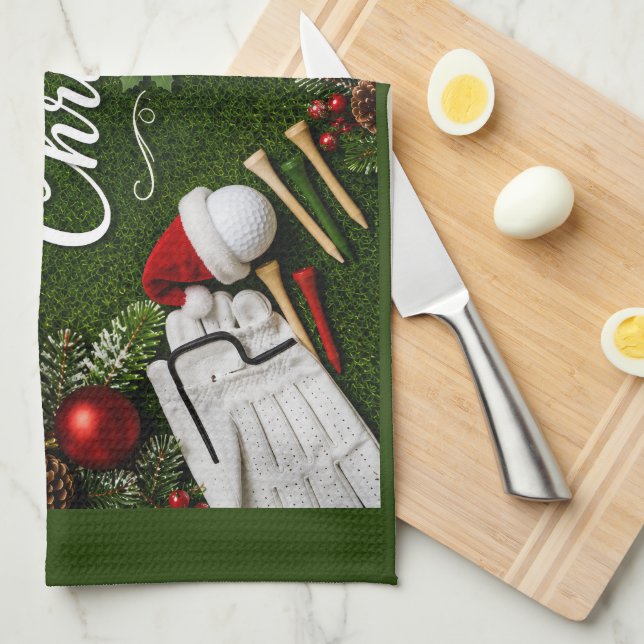 Paño De Cocina Golf con tema de Navidad sobre césped verde (Doblado Cuarto)