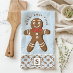 Paño De Cocina Hombre de pan de jengibre Monograma azul Feliz Nav<br><div class="desc">Celebra la temporada de fiestas con este personalizado de pan de jengibre. Con un lindo hombre de pan de jengibre con corbata de arco rojo, un saludo festivo "Feliz Navidad" y un monograma personalizado sobre un fondo azul, esta toalla le agrega un toque divertido y festivo a la decoración de...</div>