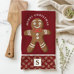 Paño De Cocina Hombre de pan de jengibre Monograma rojo Feliz Nav<br><div class="desc">Celebra la temporada de fiestas con este personalizado de pan de jengibre. Con un lindo hombre de pan de jengibre con corbata de arco rojo, un saludo festivo "Feliz Navidad" y un monograma personalizado sobre un fondo rojo, esta toalla le agrega un toque divertido y festivo a la decoración de...</div>
