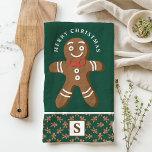 Paño De Cocina Hombre de pan de jengibre Monograma verde Feliz Na<br><div class="desc">Celebra la temporada de fiestas con este personalizado de pan de jengibre. Con un lindo hombre de pan de jengibre con corbata de arco rojo, un saludo festivo "Feliz Navidad" y un monograma personalizado sobre un fondo verde, esta toalla le agrega un toque divertido y festivo a la decoración de...</div>